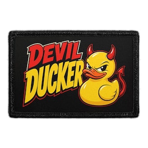 May include: A rectangular black patch featuring a yellow rubber duck with red devil horns and a red tail. The text DEVIL DUCKER is printed in bold red and yellow letters to the left of the duck. The patch has a black stitched border.