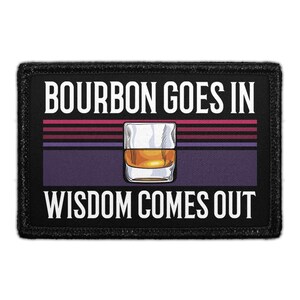 May include: A rectangular black patch with a white border featuring the text BOURBON GOES IN WISDOM COMES OUT in white capital letters. The center displays a graphic of a glass filled with amber liquid against horizontal stripes of red and purple.