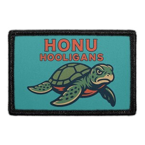 May include: A rectangular patch with a black border on a teal background. It features a green sea turtle illustration with a stern expression and the orange text HONU HOOLIGANS centered above the turtle in a bold, sans-serif typeface.