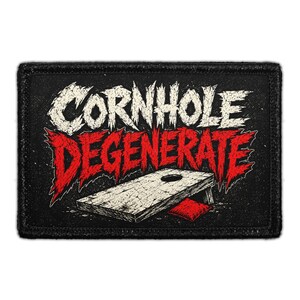 May include: A rectangular black patch featuring the white distressed text CORNHOLE above the red distressed text DEGENERATE. Below the text is a graphic of a wooden cornhole board with a single hole and a small red bean bag on the ground.