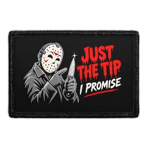 May include: A rectangular black patch featuring a graphic illustration of a figure wearing a white hockey mask with red markings. The figure holds a silver knife, and the text reads JUST THE TIP I PROMISE in red and white dripping letters.