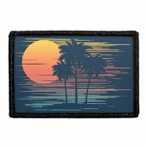 May include: A rectangular embroidered patch featuring a sunset scene with a large yellow and orange sun, three dark blue palm tree silhouettes, and horizontal lines in shades of yellow, orange, and light blue against a dark blue background.