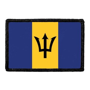 May include: A rectangular patch featuring the national flag of Barbados. The design consists of three vertical bands in blue, yellow, and blue, with a black trident head centered in the yellow band. The patch has a thick, black stitched border.