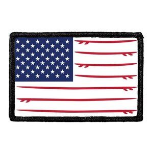 May include: A rectangular embroidered patch featuring a stylized American flag design. The blue canton contains white stars, while the red stripes are replaced by horizontal red surfboard silhouettes against a white background, bordered by black.
