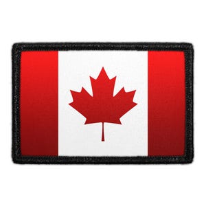 May include: A rectangular patch featuring the Canadian flag. The flag design includes a central white square with a red maple leaf, flanked by two vertical red bars. The patch has a black border.