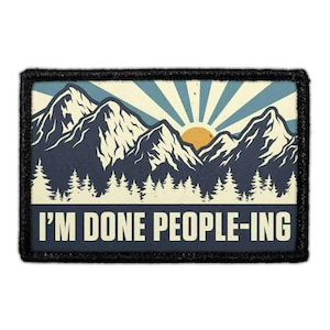 May include: Rectangular patch with a mountain and sun design. The patch features a mountain range in navy blue, a rising sun, and the text "I'M DONE PEOPLE-ING" in white. The patch has a black border.