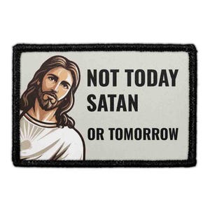 May include: A rectangular patch with a black border featuring an illustration of a person with long brown hair and a beard wearing a white robe. The text NOT TODAY SATAN OR TOMORROW is printed in bold black capital letters on a light gray background.