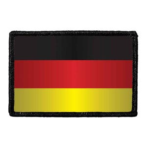 May include: A rectangular patch featuring the flag of Germany with horizontal stripes of black, red, and gold. The design is enclosed by a thick, textured black border that frames the tricolor pattern, creating a distinct and defined edge.
