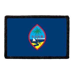 May include: A rectangular patch featuring the flag of Guam with a dark blue background and a central almond-shaped emblem. The emblem displays a palm tree, a proa boat on the water, and a sandy shore, with the red text GUAM centered inside.