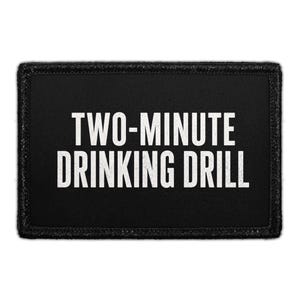 May include: A rectangular black patch with a stitched border featuring the white text TWO-MINUTE DRINKING DRILL centered in a bold, sans-serif font. The design is clean and high-contrast, displaying the words clearly against the dark background.