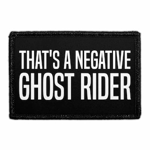 May include: Black rectangular patch with white text that reads "THAT'S A NEGATIVE GHOST RIDER". The patch has a black border. The text is in a bold, sans-serif font.