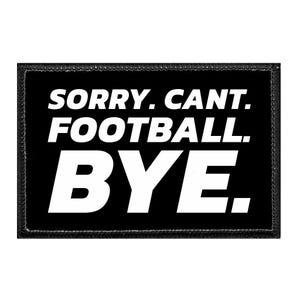 May include: A rectangular black patch with a stitched border featuring the white text SORRY. CANT. FOOTBALL. BYE. in a bold, sans-serif font. The design is centered on the black fabric background, creating a high-contrast, readable graphic patch.