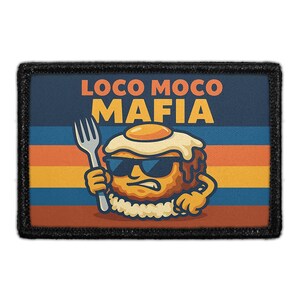 May include: A rectangular patch with the words "LOCO MOCO MAFIA" in orange and yellow. The patch features a cartoon egg character wearing sunglasses and holding a fork. The background has blue, orange, and yellow stripes.