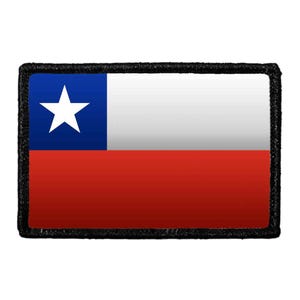 May include: A rectangular patch featuring the national flag of Chile, which consists of a white star on a blue square in the upper left corner, with a white horizontal stripe on the top right and a red horizontal stripe across the bottom.