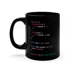 May include: Black ceramic mug with colorful code snippets about tea. The code includes functions for drinking tea and the message: "Get shit done!" The mug has a capacity of approximately 325 ml.