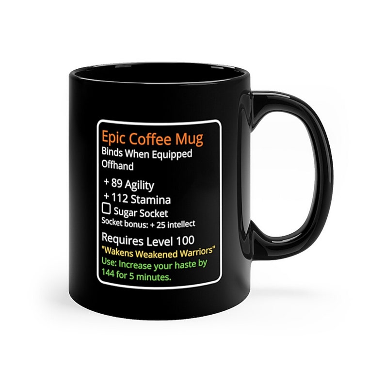 May include: Black coffee mug with a white design that looks like a video game item description. The text reads "Epic Coffee Mug", "Binds When Equipped Offhand", "+ 89 Agility", "+ 112 Stamina", "Sugar Socket", "Socket bonus: + 25 intellect", "Requires Level 100", "Wakens Weakened Warriors", "Use: Increase your haste by 144 for 5 minutes."