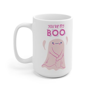 May include: White ceramic mug with a pink ghost illustration and the text "You're my BOO" in pink lettering.