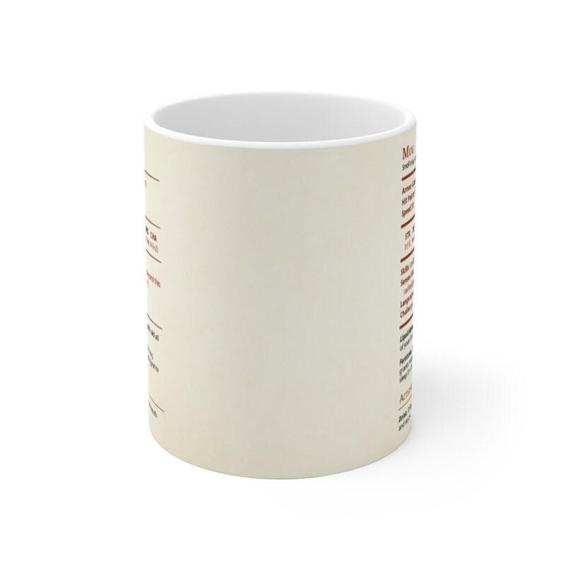 May include: A white ceramic mug with a beige background and red text. The text describes the characteristics of a mythical creature. The text includes the words "Mythical Creature", "Alignment", "Size", "Speed", "Armor Class", "Hit Points", "Skills", "Senses", "Languages", "Challenge", "Special Abilities", "Actions", "Legendary Actions", and "Description".
