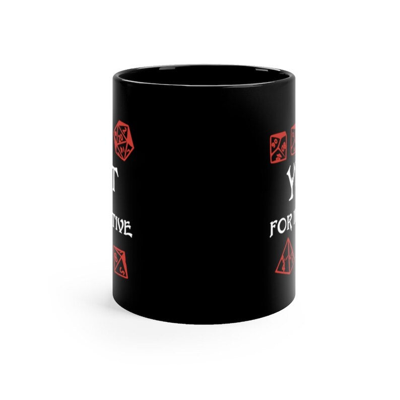 May include: Black ceramic mug with white text that reads "You're not a real gamer until you've rolled a natural 20."  The text is surrounded by red dice symbols.