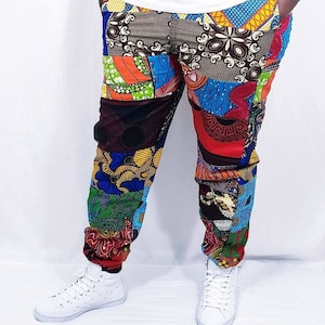 May include: Multicolored patchwork pants with a variety of geometric and floral patterns. The pants are made of a soft, comfortable fabric and have a relaxed fit.