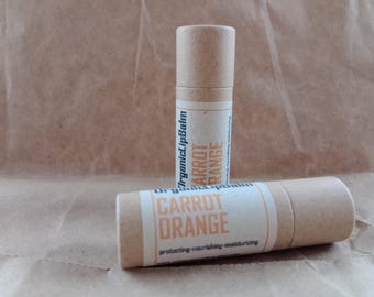 Bálsamo labial orgânico: óleo de semente de cenoura, aroma de laranja, protetor solar labial FPS 10, livre de plástico.
