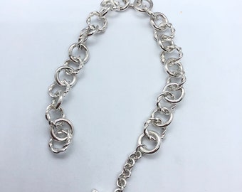 Círculos de pulsera de plata