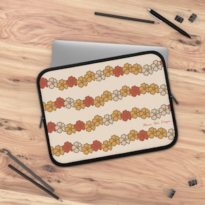 Cream Puakenikeni Laptop Sleeve| Puakenikeni laptop sleeve, Pua computer sleeve, Hawaii computer sleeve, College necessities, Lei sleeve
