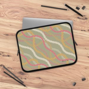 Na Lei Laptop Sleeve in Olive | Puakenikeni laptop sleeve, Pua computer sleeve, Hawaii computer sleeve, College necessities, Lei sleeve