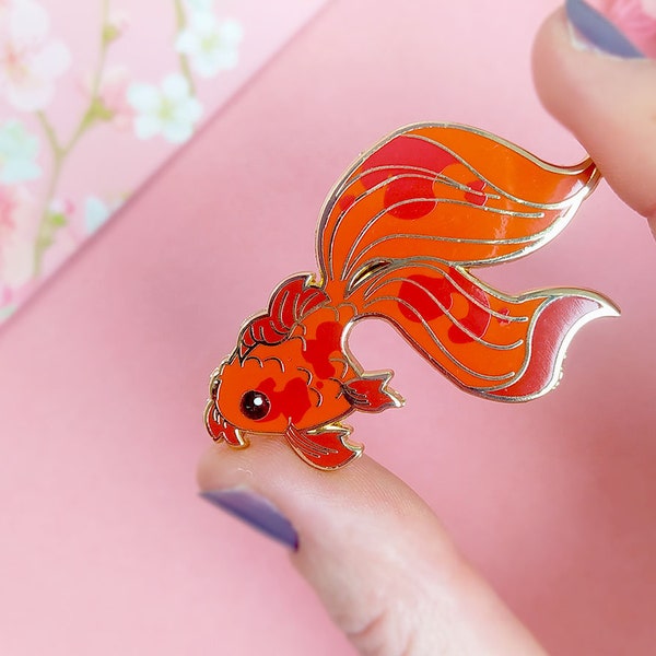 Red fish pin