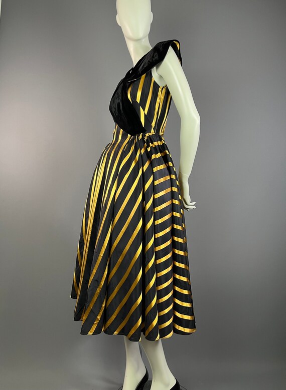 Black and gold striped dress deals
