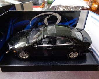 2006 Black Ford Fusion 1:24 Scale #31999
