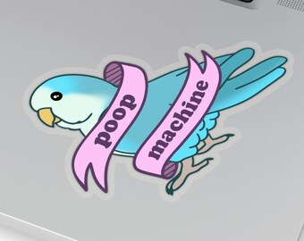 May include: A blue and white parakeet with a pink ribbon that says "poop machine" on it. The parakeet is looking to the left.