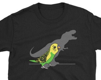 Maglietta verde con ombra di T-Rex e pappagallo