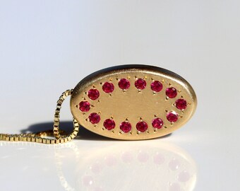 Ruby Necklace with Floating Oval Pendant in 14k Yellow Gold