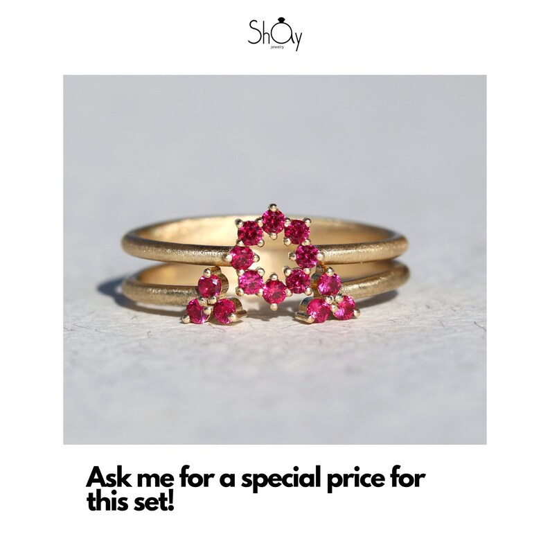 May include: A gold ring set with two bands, the top band features a star shape made of small pink gemstones. The text "Ask me for a special price for this set!" is below the image.