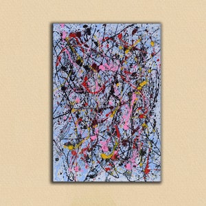 Puede incluir: Pintura abstracta con fondo azul y salpicaduras y l&iacute;neas de pintura negra, blanca, roja, rosa y amarilla.
