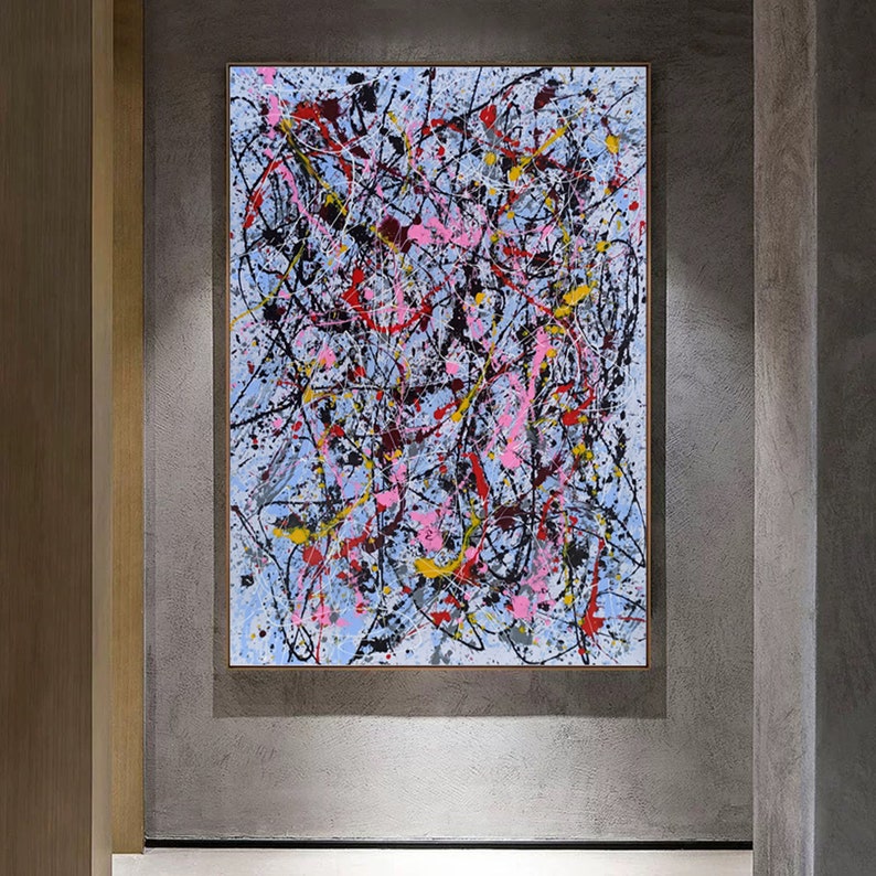 Puede incluir: Pintura abstracta con fondo azul y salpicaduras de pintura rosa, amarilla, roja y negra.