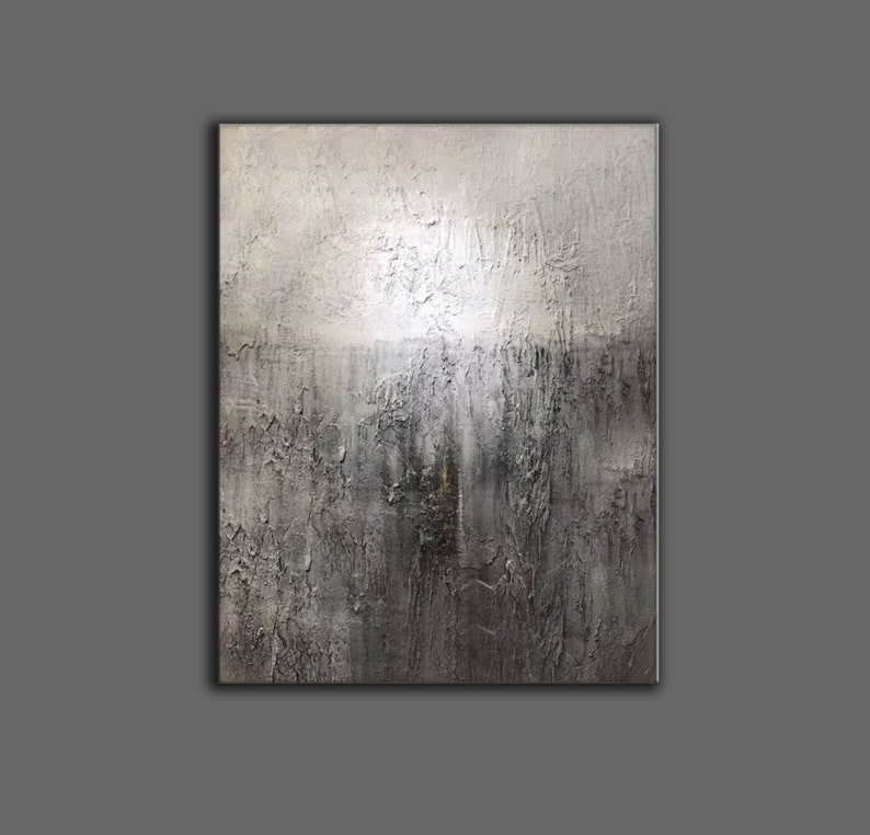May include: Abstract painting with a textured surface. The painting is mostly gray and white with hints of brown and black.