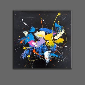 May include: Abstract painting with splashes of blue, yellow, pink, orange, and white paint on a black background.