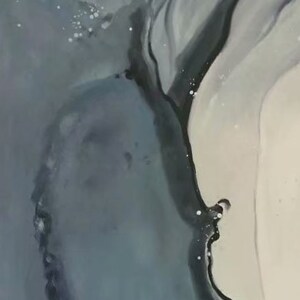May include: Abstract painting with swirling blue, gray, and black paint. The colors blend together to create a sense of movement and depth.