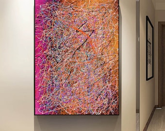 May include: Abstract painting with a colorful, chaotic design. The painting features a mix of black, orange, pink, and blue lines and swirls.
