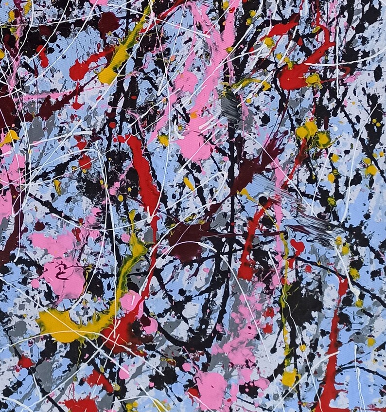 Puede incluir: Pintura abstracta con fondo azul y salpicaduras de pintura roja, amarilla, rosa, blanca y negra.