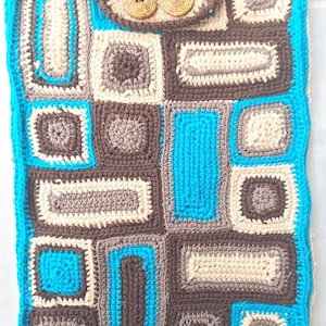 Tablet case with button closure, approx. 22 x 33 cm, made from crocheted squares and rectangles, brown and turquoise