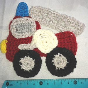Crocheted fire engine appliqué with blue lights