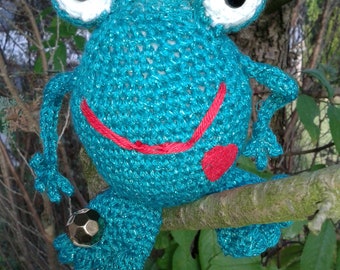 Crocheted frog, frog prince in love with gold ball