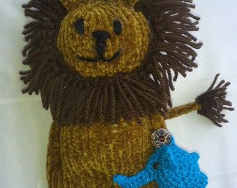 Lion knitted from chenille yarn with a small elephant