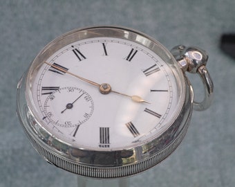 Reloj de bolsillo de cuerda de llave Waltham 1876 14s más pequeño con caja plateada