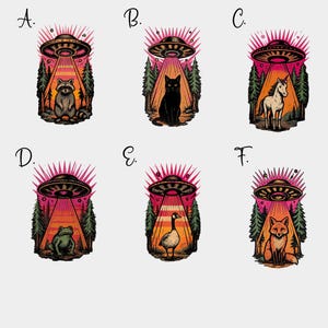 May include: A collection of six colorful illustrations featuring a UFO beaming light onto different animals. The animals include a raccoon, black cat, unicorn, frog, goose, and fox. Each design has a pink and orange sunset background with trees.