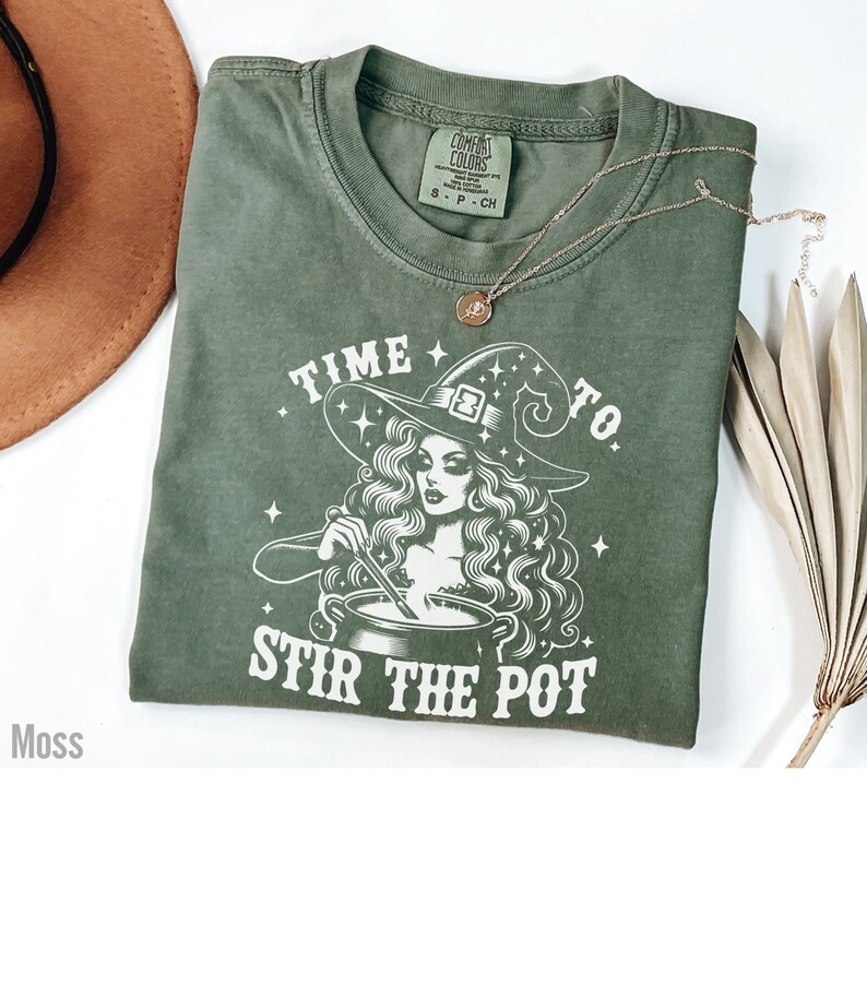 Halloween pun shirt with diva witch stirring a pot with the words time to stir the pot