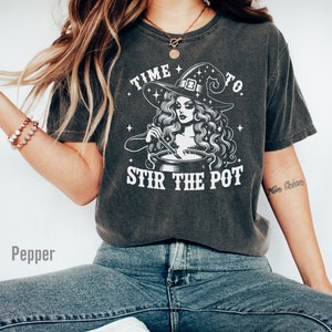 Halloween pun shirt with diva witch stirring a pot with the words time to stir the pot